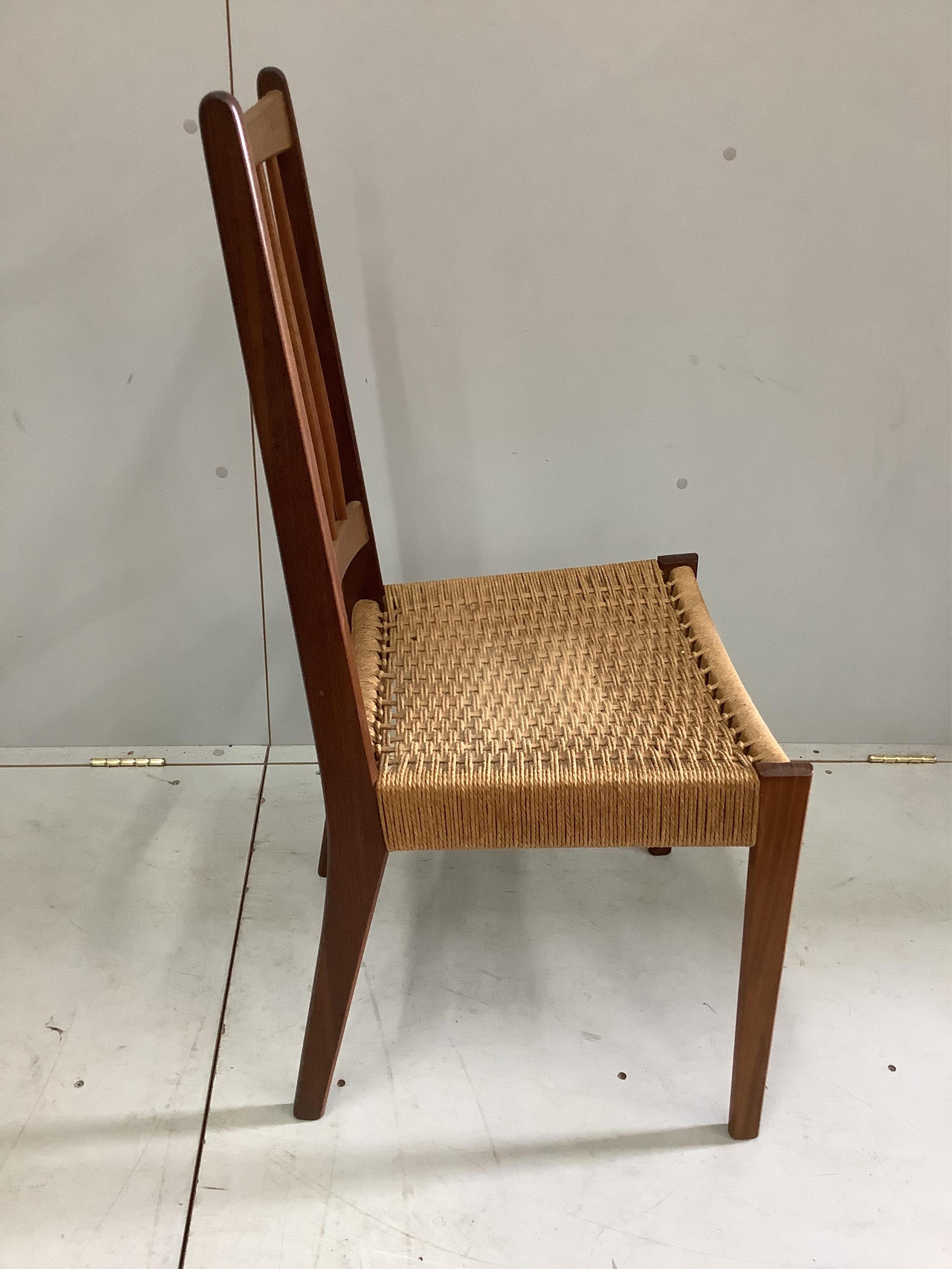 Arne Hovmand Olsen for Mogens Kold, a set of eight teak dining chairs with paper cord seats, width 46cm, depth 44cm, height 98cm. Condition - good